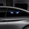 A car exterior featuring a custom ambient light design resembling demon eyes on the side panel.