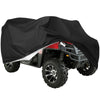 A black heavy-duty ATV cover is shown protecting a red and black off-road vehicle from the elements.