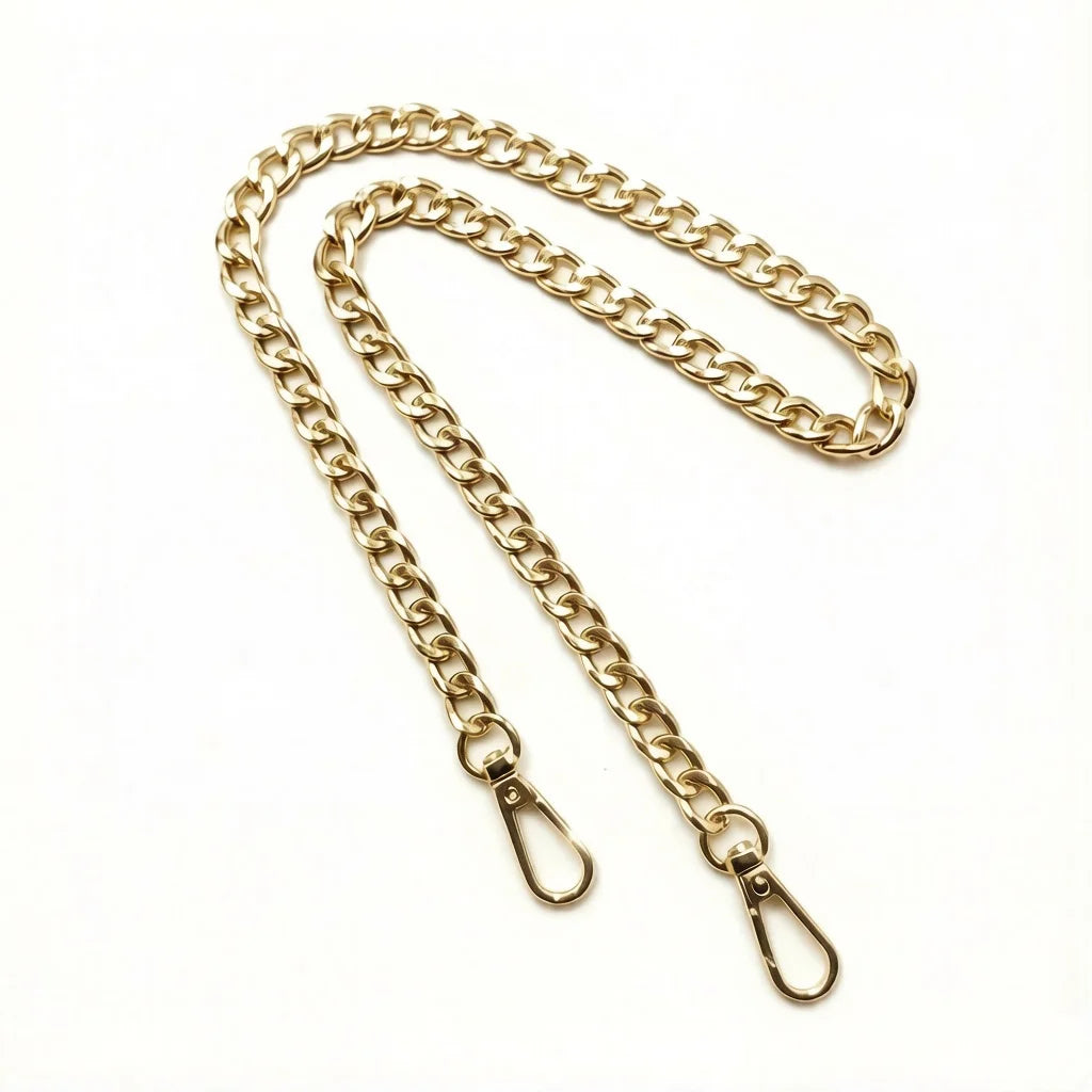 A gold-colored metal chain strap for handbags and crossbody bags.