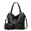 Black women's PU leather tote bag with a detachable crossbody strap.