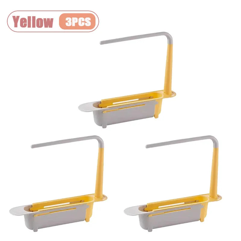 Three yellow adjustable over-sink dish drying racks for kitchen organization