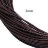 Close-up of dark brown braided leather cord, 6mm in diameter.