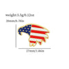 Gold enamel pin shaped like the American flag featuring stars and stripes