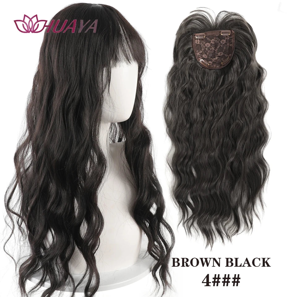A display of long, wavy brown black hair strands with clips for a hair topper product.