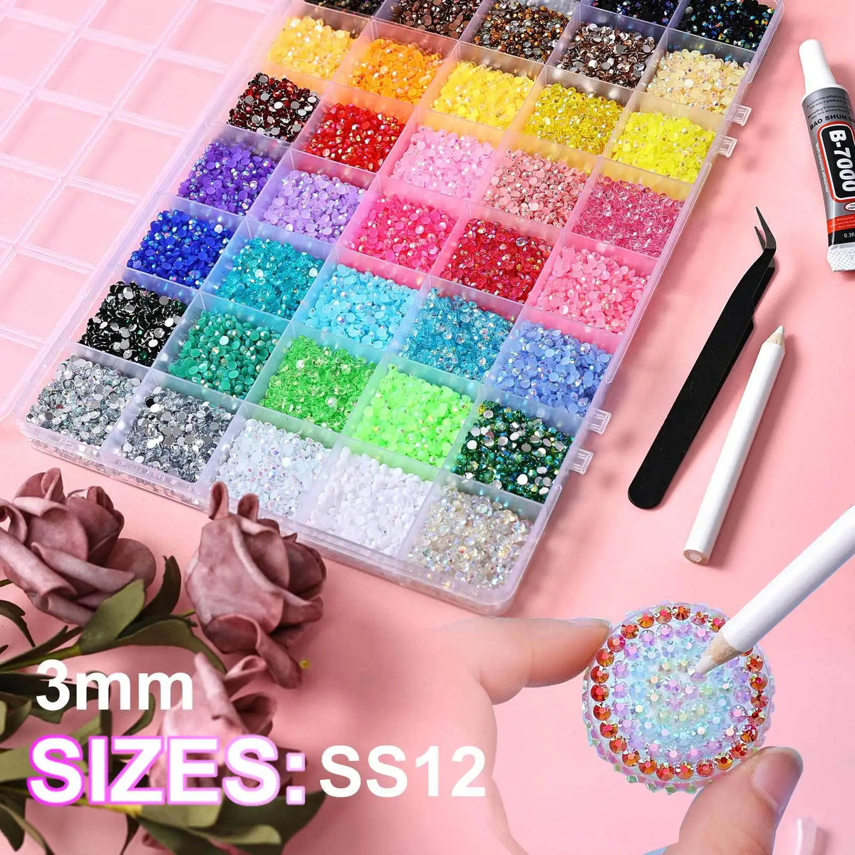 A clear plastic box filled with various mixed color acrylic rhinestones and flatbacks for craft decoration