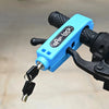 A blue compact handlebar lock is attached to a bicycle handlebar, featuring a key mechanism.