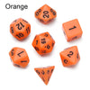 A set of orange polyhedral dice including a d20, d12, d10, and d6.