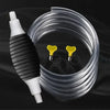 A white manual siphon pump is shown next to a clear plastic hose coiled around two yellow transfer funnels.