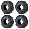 Four black Monster Truck mud terrain rubber tires for RC crawlers shown from different angles.