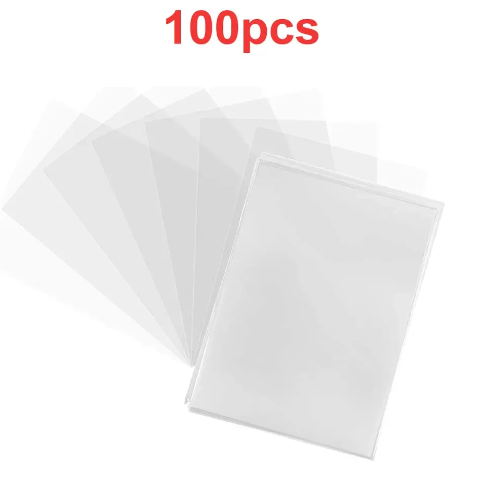 A pack of 100 clear plastic card sleeves for collectible cards.