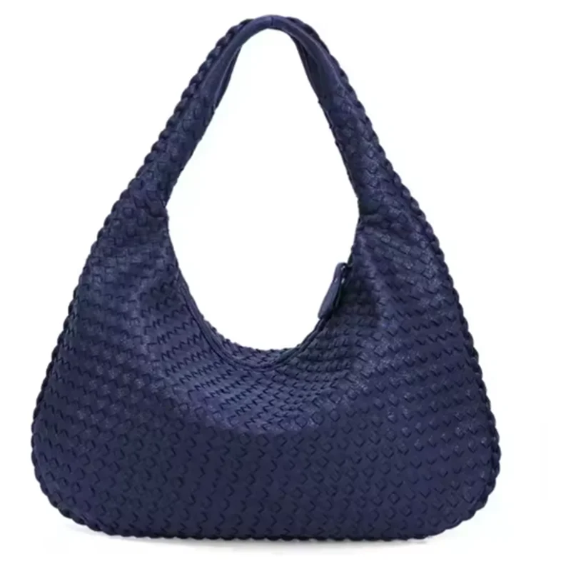 A dark navy vegan leather woven hobo bag with a drawstring closure.