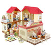A miniature dollhouse set featuring a forest animal theme with houses, furniture, and small figures.
