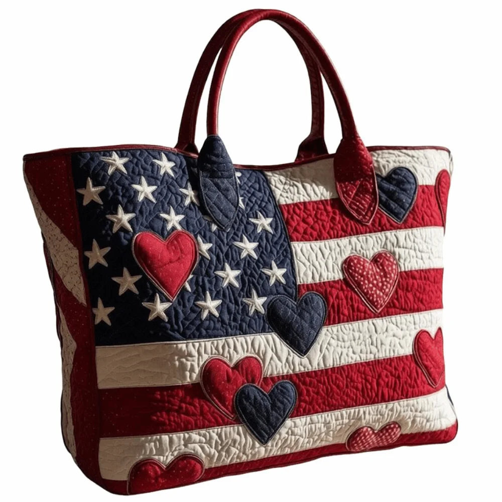 A red and white American flag patterned quilted tote bag with heart accents.