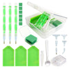 A complete diamond painting accessory kit featuring tools, storage box, and green plastic pieces.