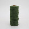 A spool of green macrame cord, 3mm/4mm thickness, used for crafting.