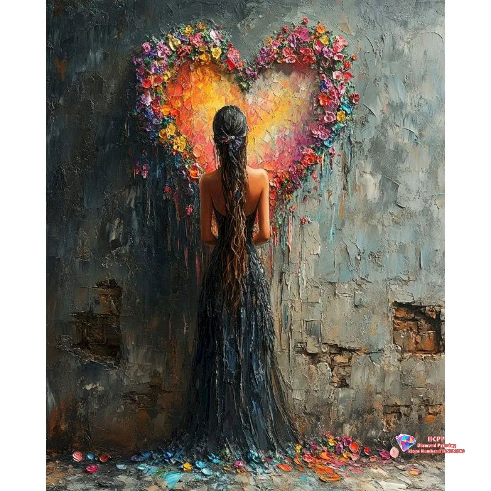 A woman with long hair stands before a vibrant heart made of colorful flowers on a textured wall.
