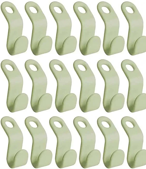 A set of light green cascading clothes hanger connector hooks for space-saving wardrobe organization.