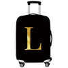 Black rolling suitcase with a gold letter L print on the side.