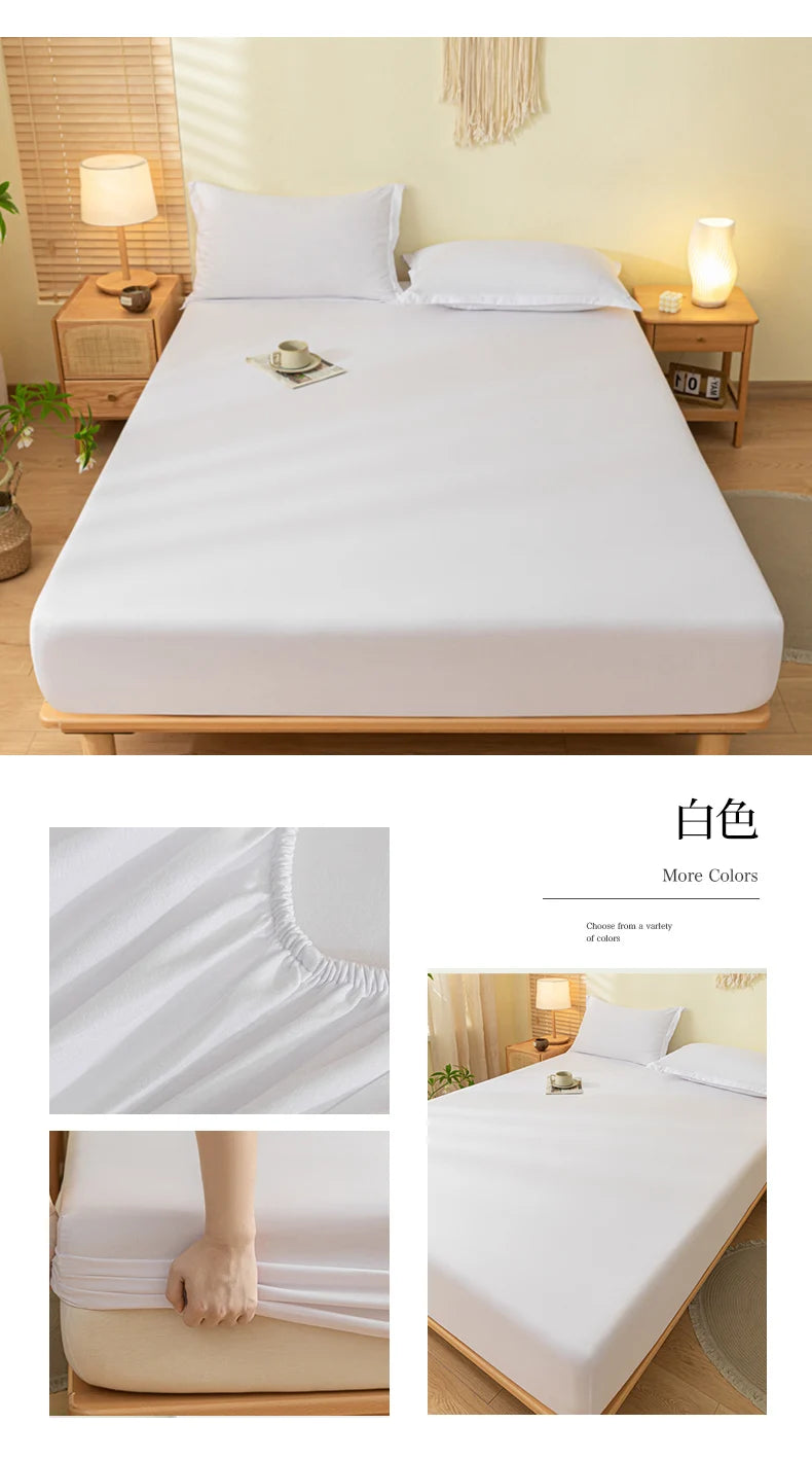A white fitted sheet with a brushed texture and elastic edge is displayed on a bed.