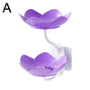 A purple two-tier bathroom storage rack with lotus-shaped cups and drainage features.