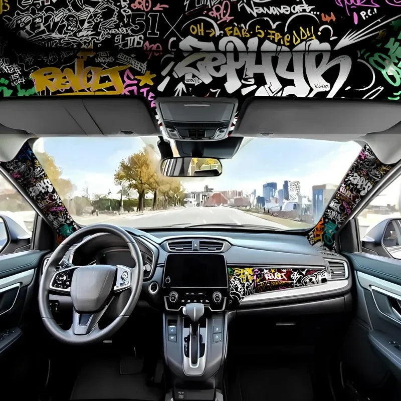 Interior view of a car with a graffiti pattern velvet wrap sticker on the dashboard and interior surfaces.