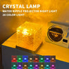 A crystal lamp projector night light displaying various 16 colors of light on a dark surface.