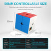 A blue and red cube with a white base, demonstrating the 50mm controllable size.
