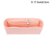 A pink felt bag organizer with multiple internal pockets and a zipper closure.