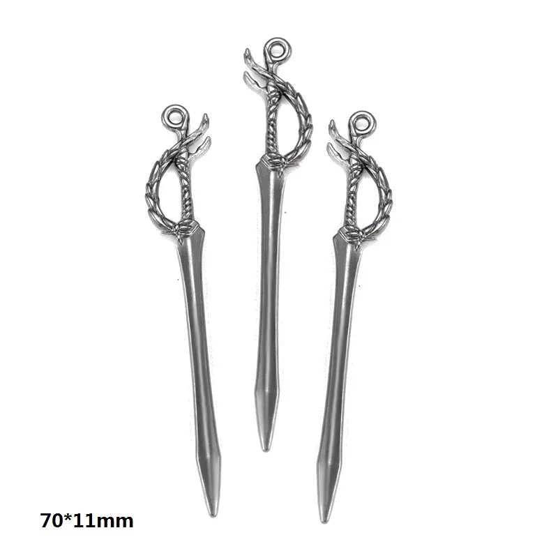A set of 16 gun-shaped charms for DIY jewelry making in silver metal.