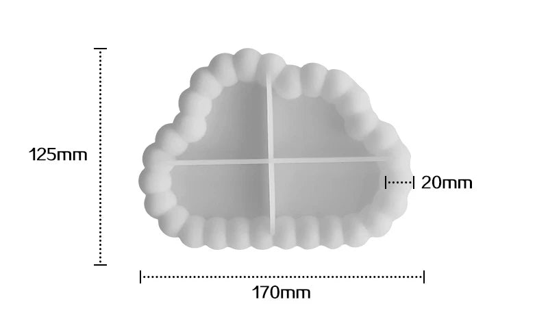 A white silicone tray mold with a scalloped edge and a cross-shaped divider, shown with dimensions.