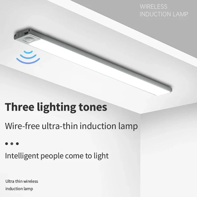 A white wireless induction lamp is mounted on a ceiling, illuminating a room.