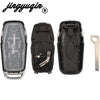 A set of black Ford Smart Key replacement shells and an uncut blade for key duplication.