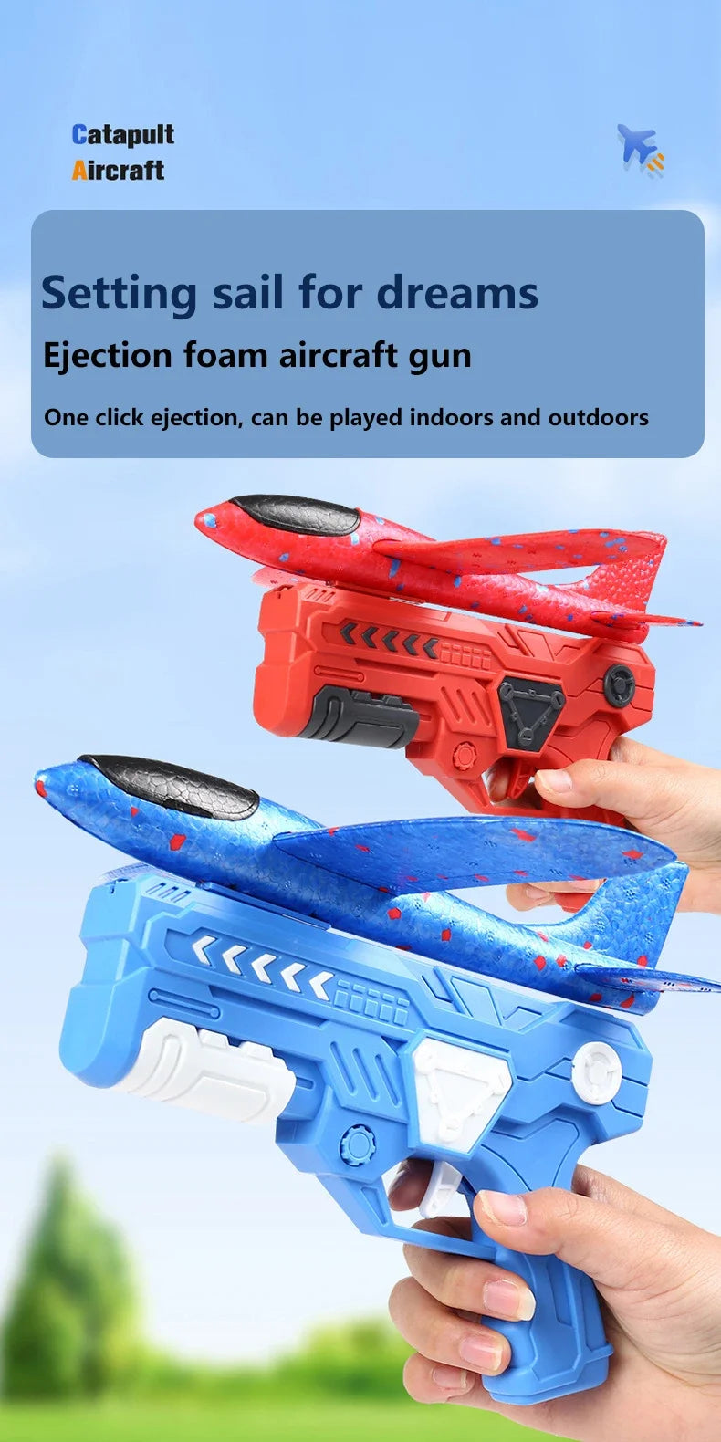 A hand holds a blue foam aircraft gun, ready to launch, with a red version visible in the background.