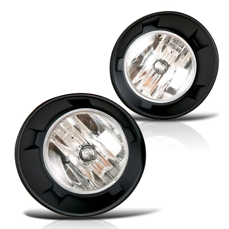 A pair of clear fog light assemblies for a 2010-2013 Chevy Camaro, shown in black housing.