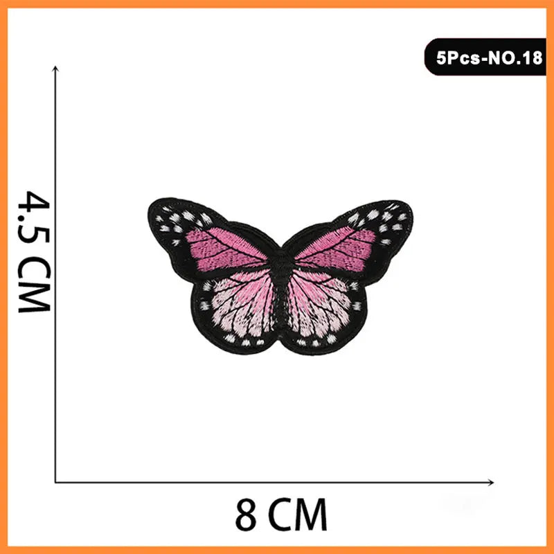 Five embroidered iron-on patches of pink and black butterfly designs.