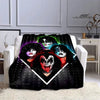 A black flannel throw blanket featuring a print of the iconic KISS band members' faces.