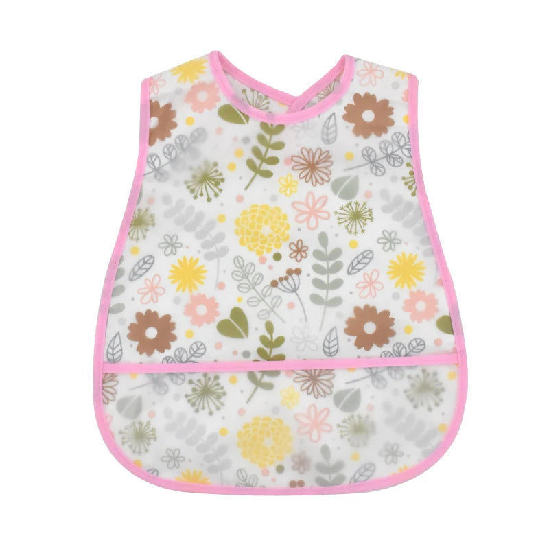 A pink and white baby feeding bib with a catch pocket featuring various floral patterns.