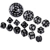 A set of fifteen polyhedral dice including d10s, d12s, d20s, and dodecahedral dice.