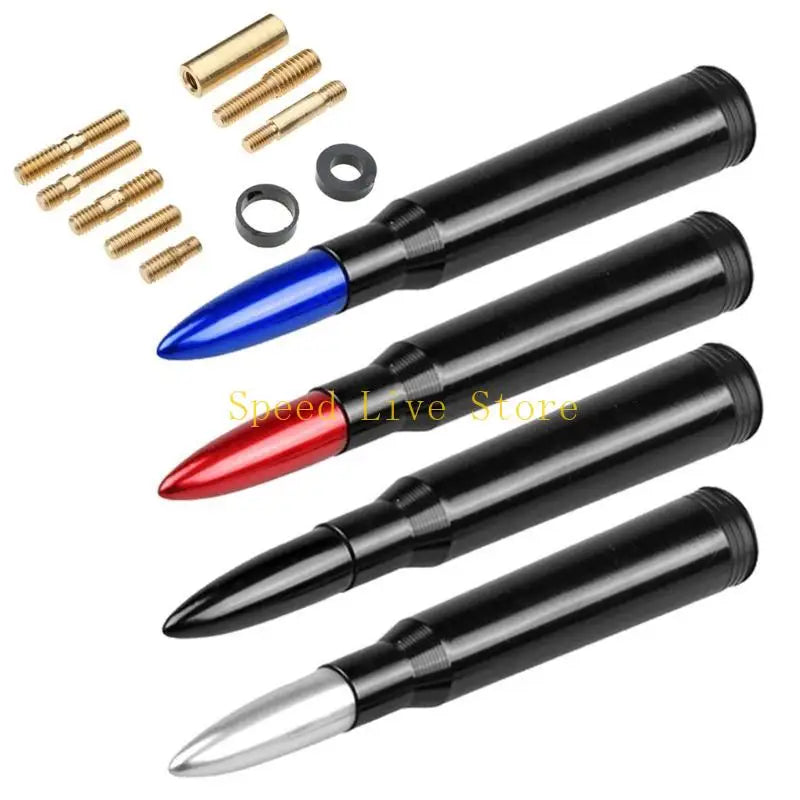 A collection of various short radio antennas and related hardware including brass screws and rings.