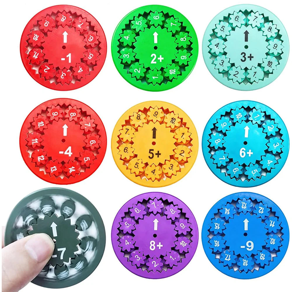 A set of nine colorful math fidget spinners showing multiplication and division operations.