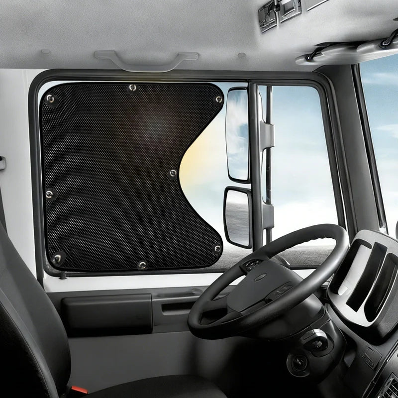 Interior view of a truck showing a black side window sunshade installed in the window.