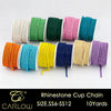 A collection of multi-colored rhinestone cup chains in various shades including green, purple, yellow, and blue.