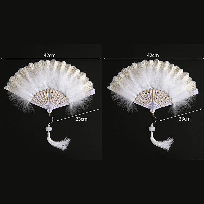 A white folding fan with a lace trim and golden edge, shown open and closed.
