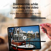A hand holds a tablet with a clear screen protector installed, showing a view of a boat.