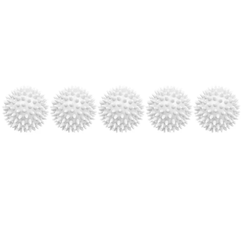 A row of white reusable laundry balls for tangle-free washing and softening.