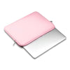 A pink universal laptop sleeve with a zipper closure shown open, resting on a white surface.