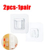 Two pairs of transparent strong adhesive hooks shown with an inset demonstrating installation on a wooden door.