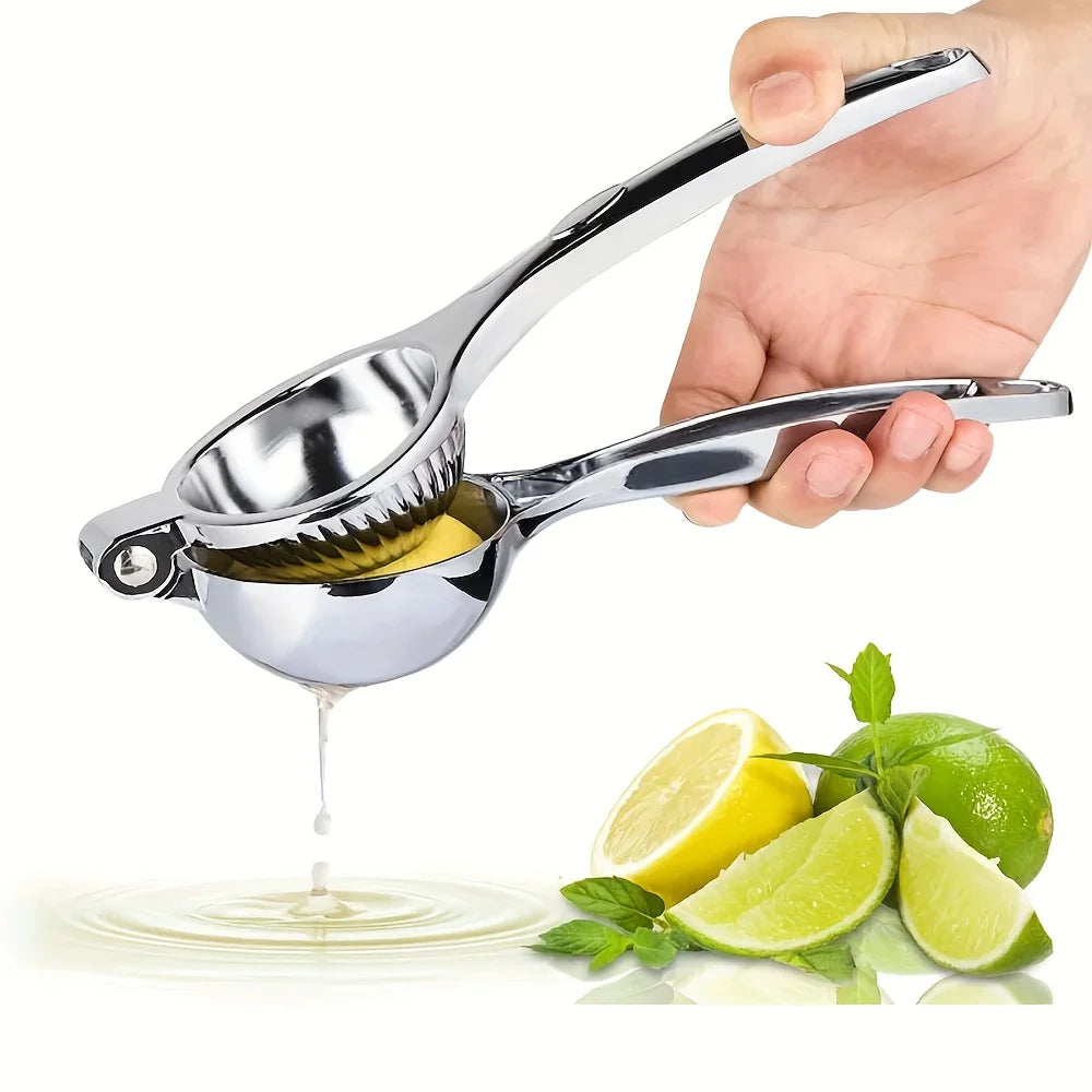 A hand is using a stainless steel manual lemon juicer to squeeze juice into a glass.