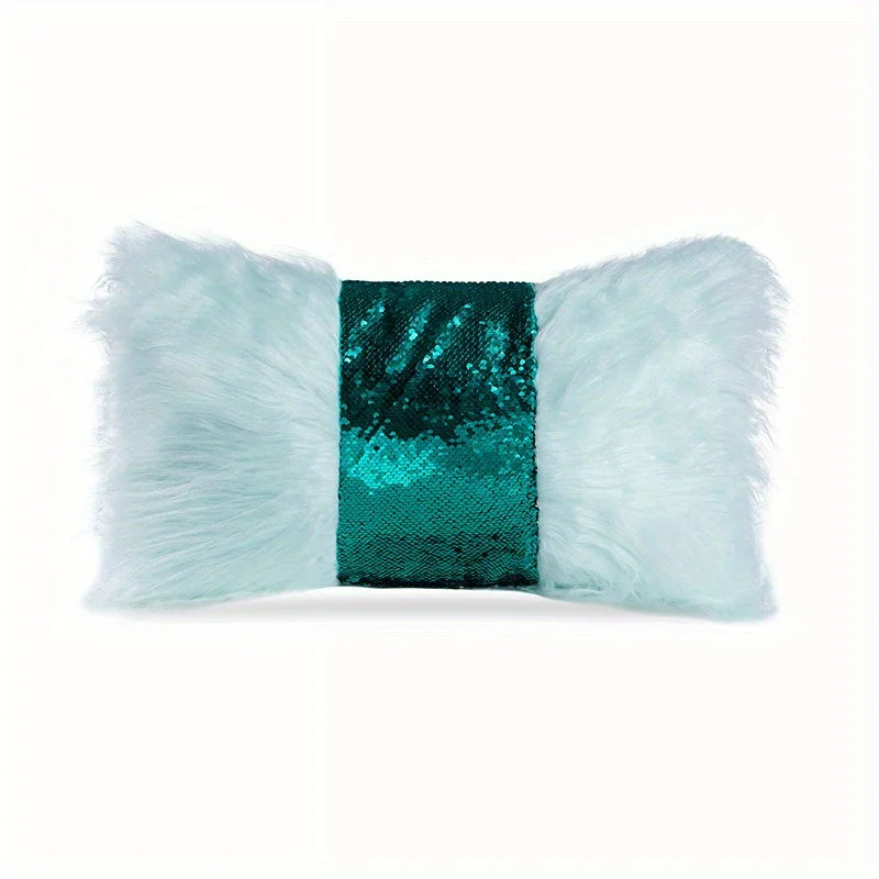 A decorative pillowcase featuring silver-blue faux fur with a central panel of green sequin fabric.