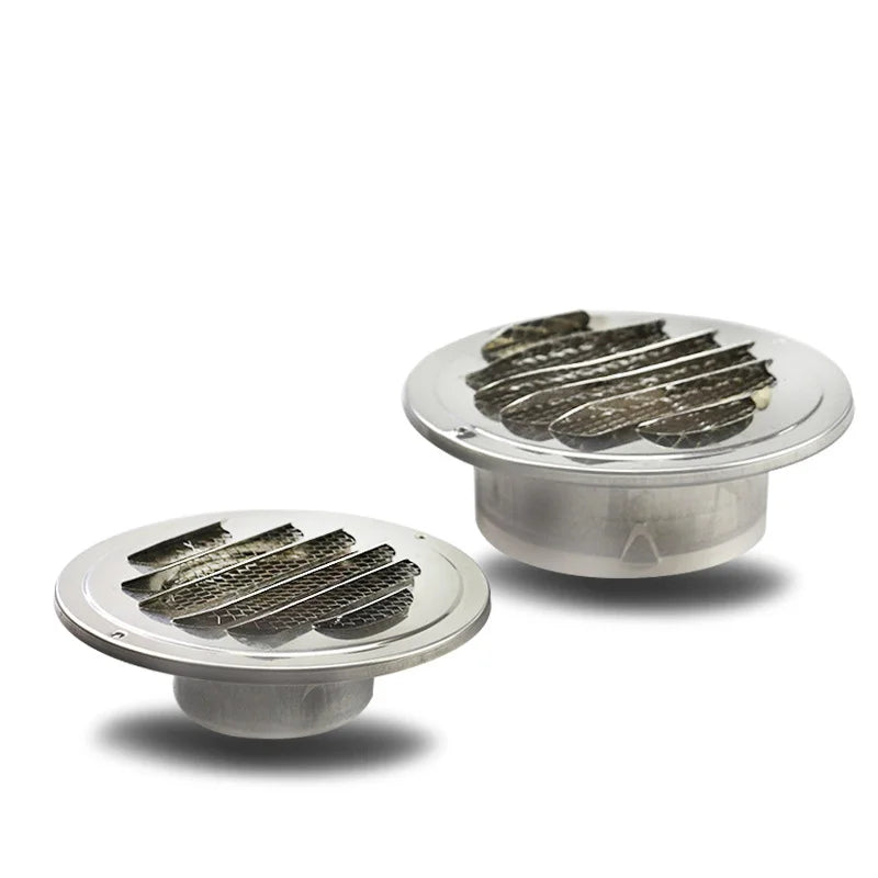 Stainless steel round ventilation grille with parallel slats.